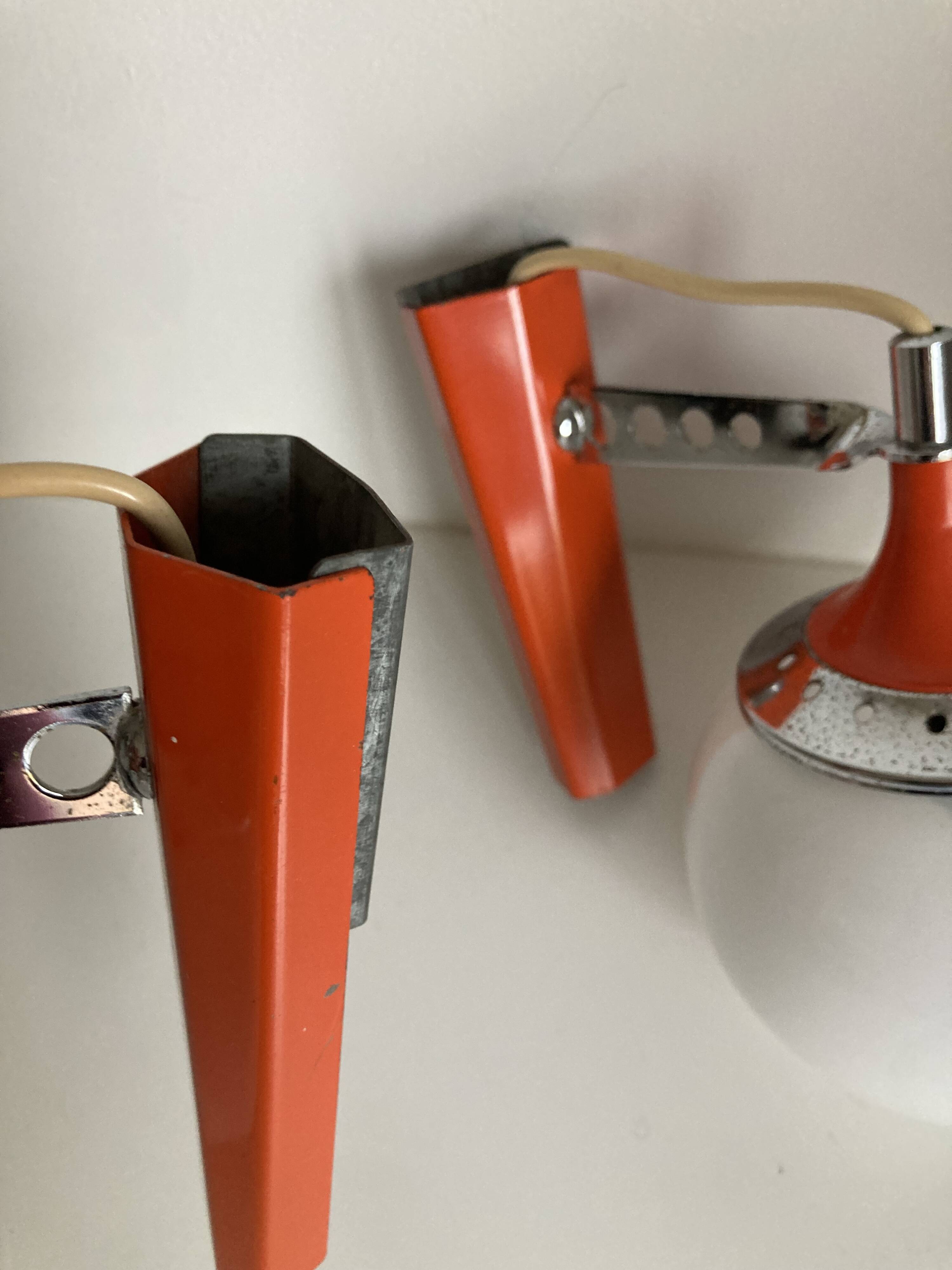 Set of two vintage orange wall lights from the 70s