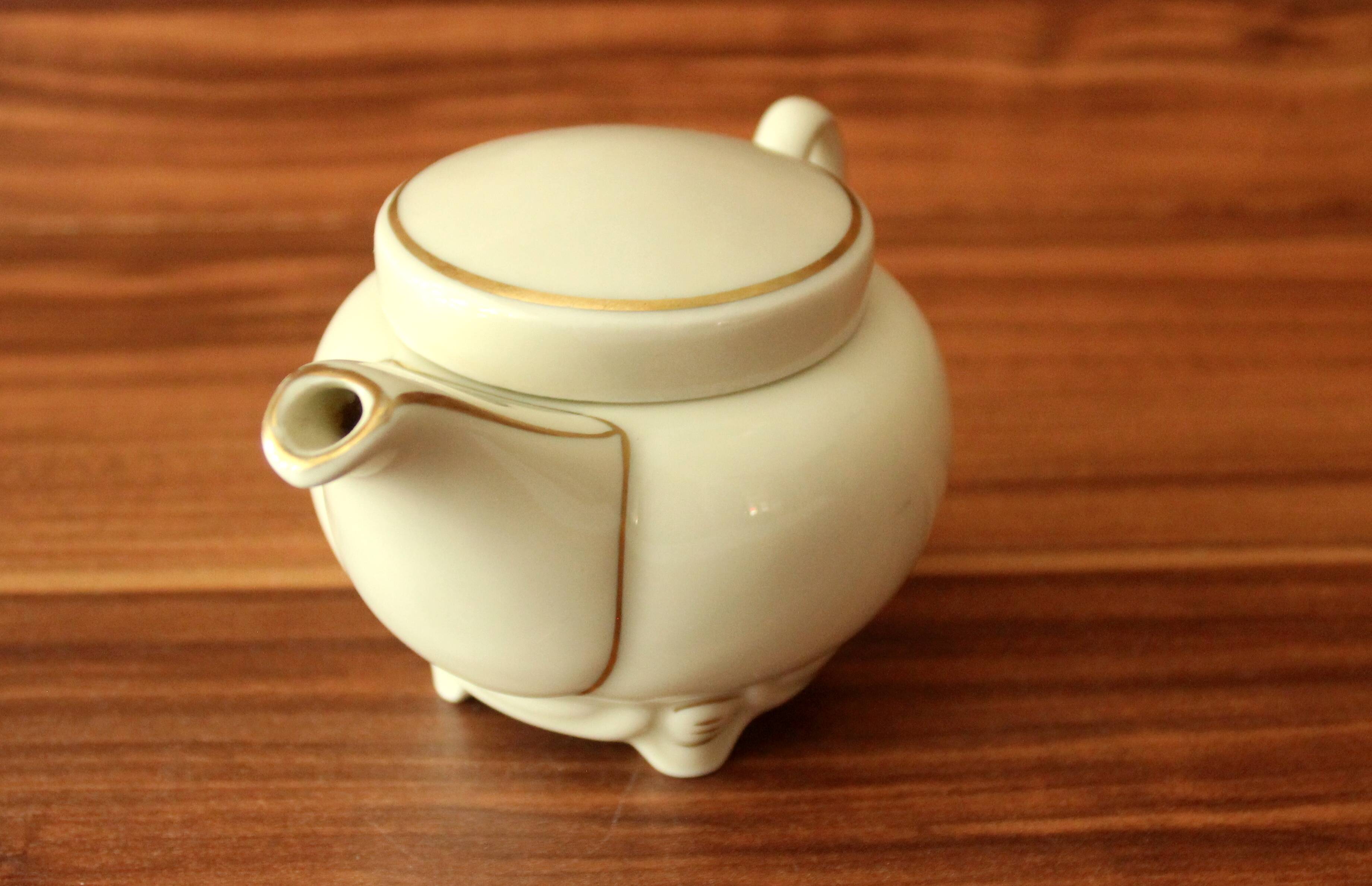 Small 1 portion porcelain teapot by Gerold/Bavaria - ivory white and gold
