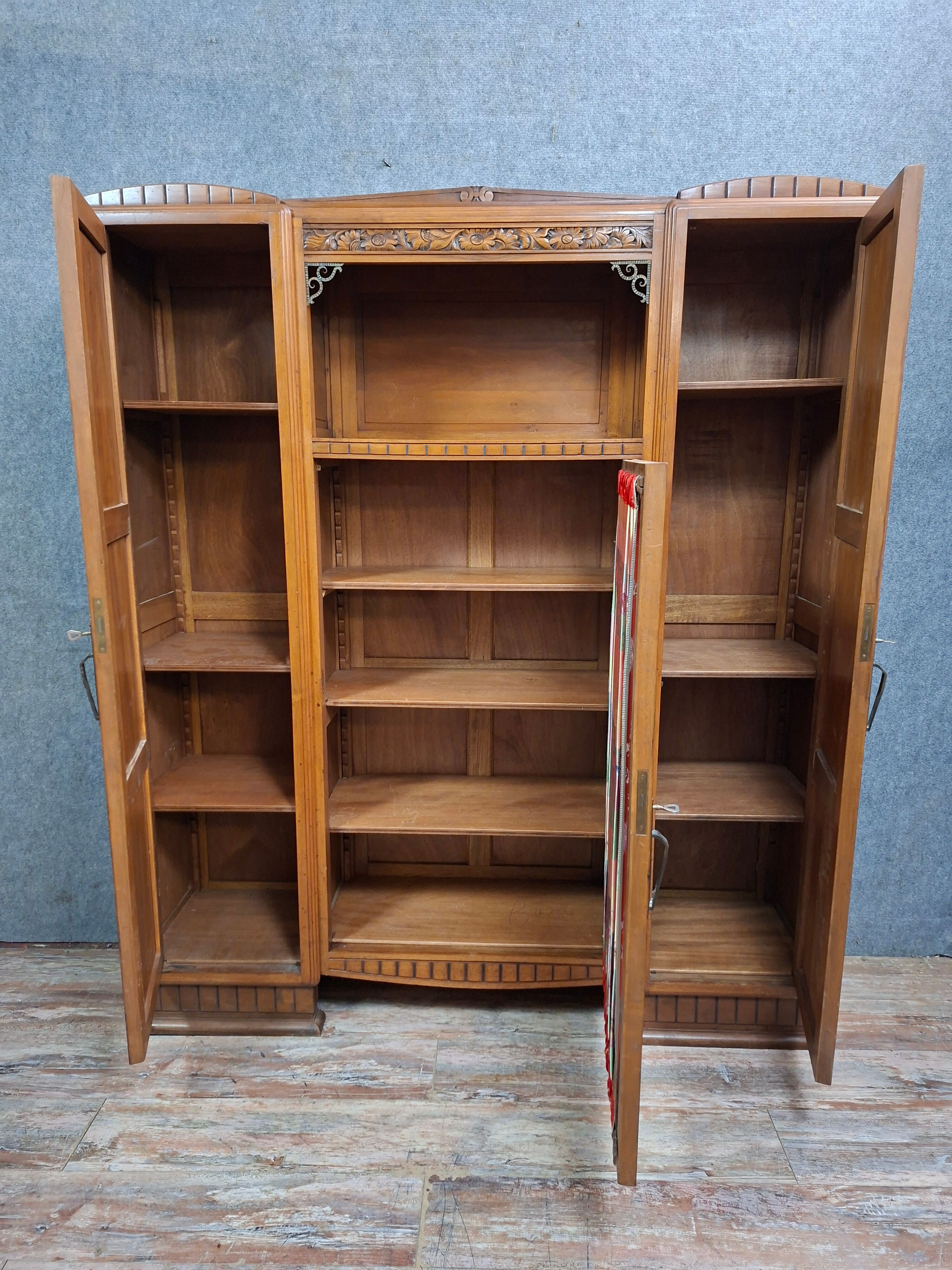 Art Deco library in carved walnut, circa 1930