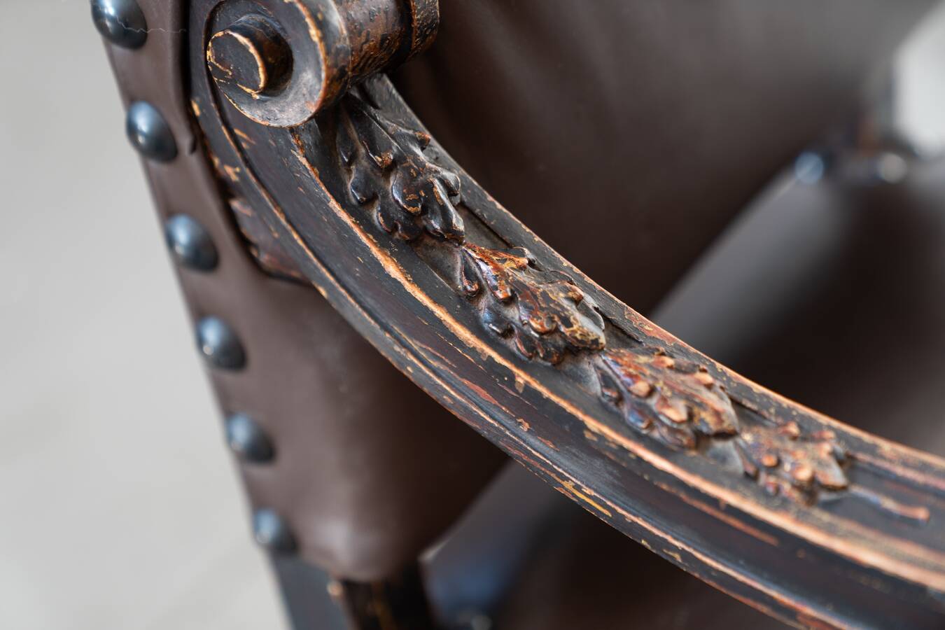 19th century beechwood, metal, and leather throne
