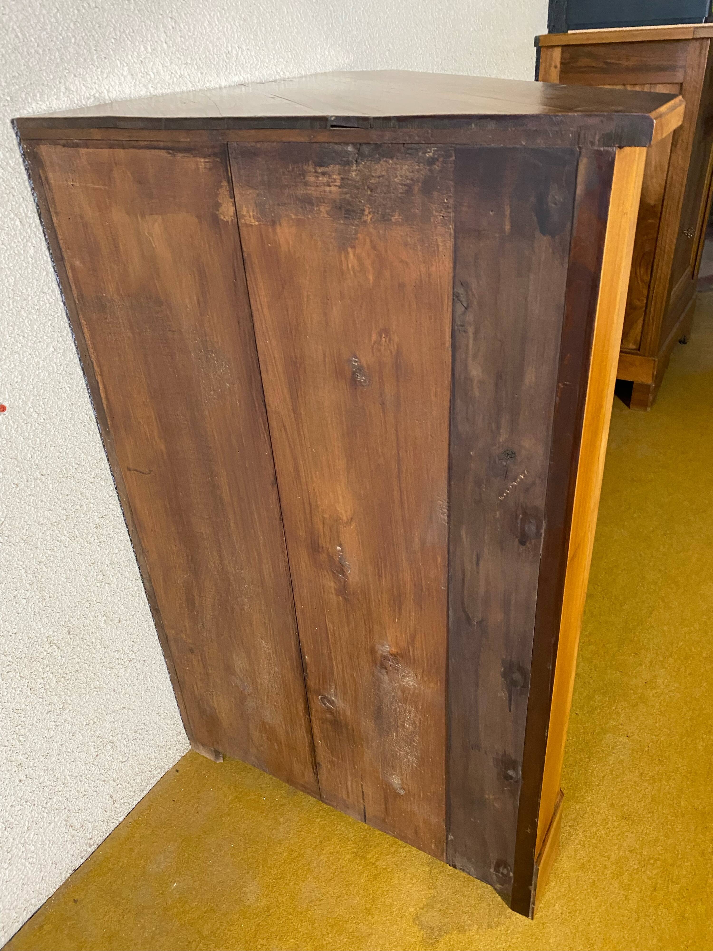 Cherry wood corner cupboard.