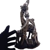 African stone sculpture of 3 Giraffes