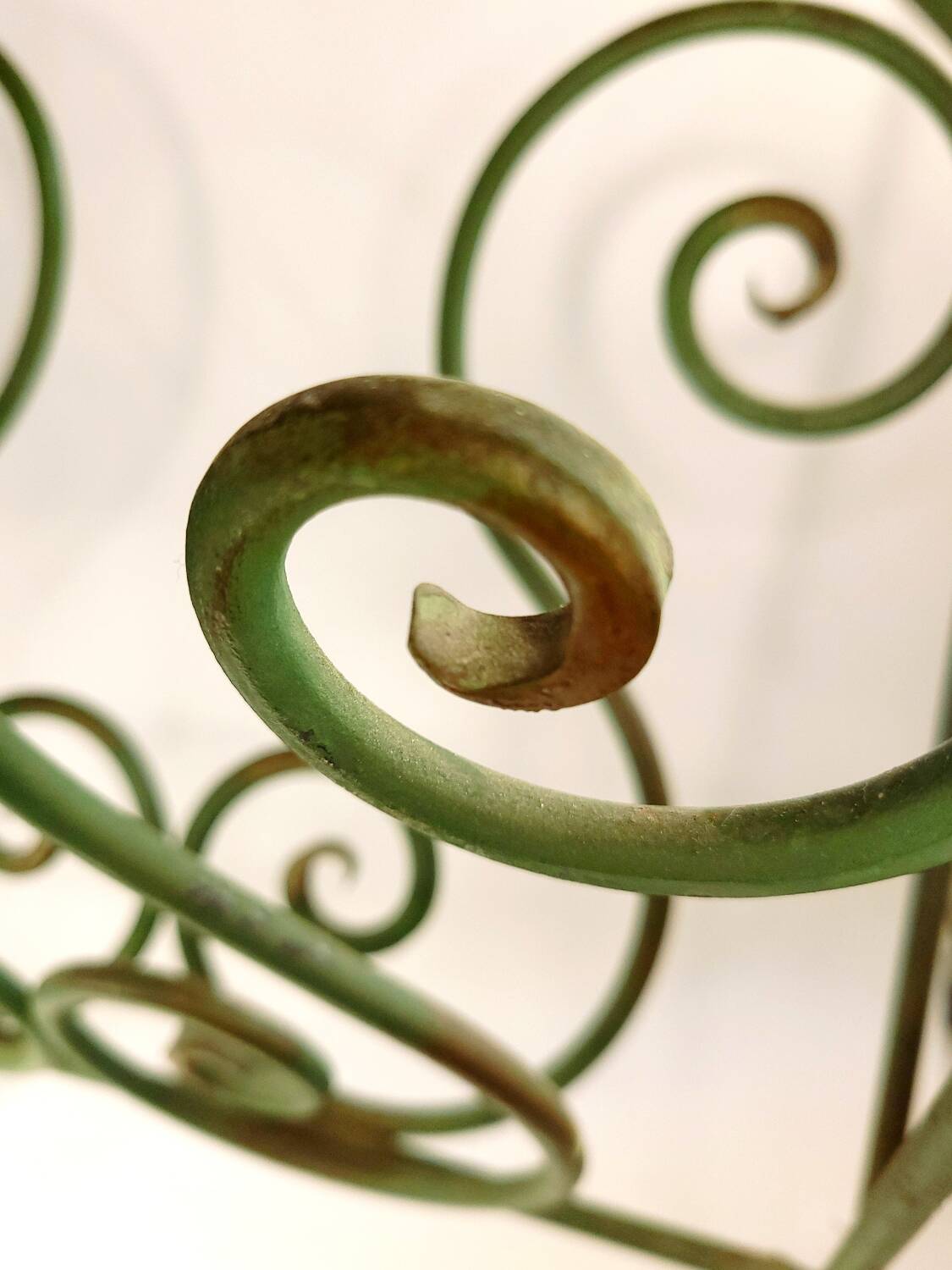 Vintage wrought iron magazine rack – handcrafted scrolls –