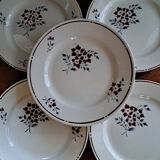 Set of 9 stencilled dinner plates