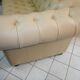 Beige leather chesterfield sofa