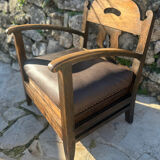 Pair of armchairs in stained wood and leather, 20th century