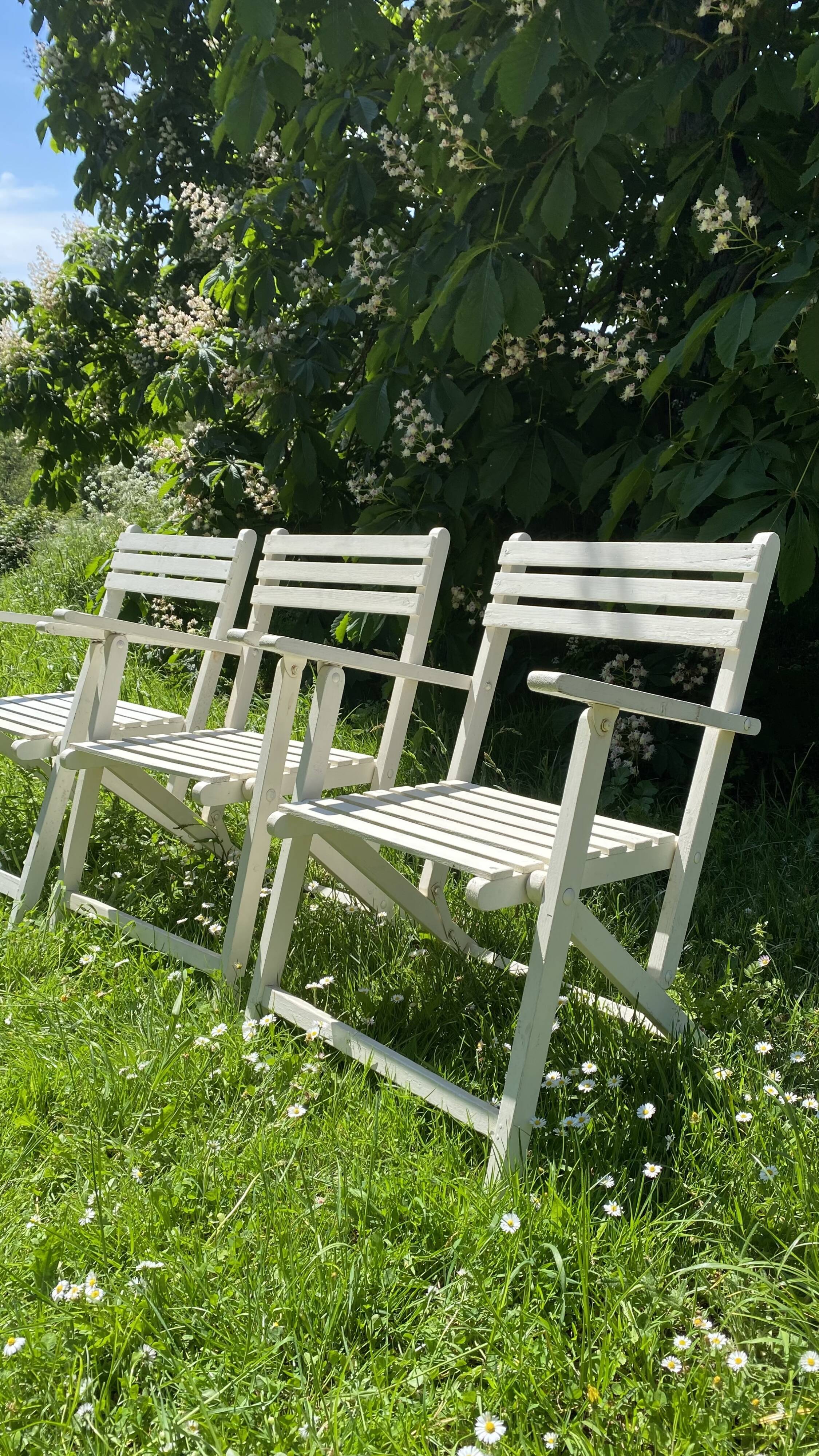 Folding slatted garden armchairs