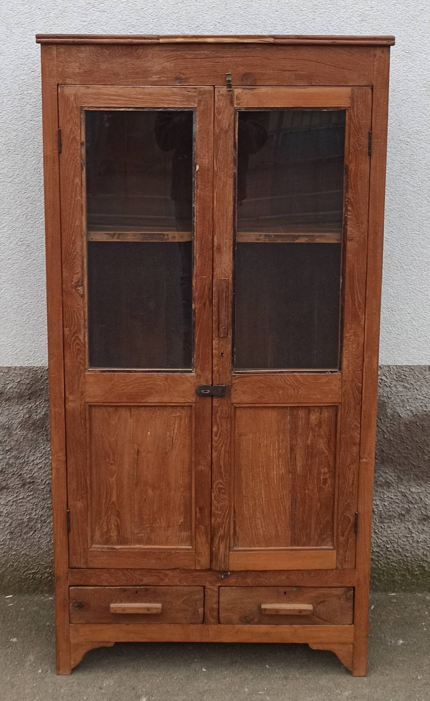 Old glazed teak cabinet