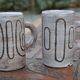2 mugs en céramique signés db