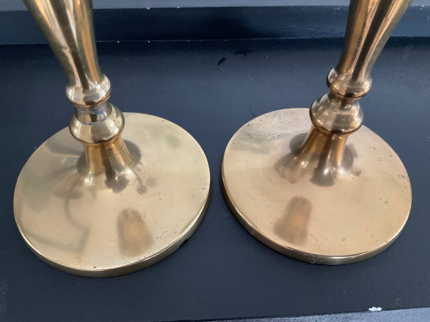 Pair of old bronze candlesticks
