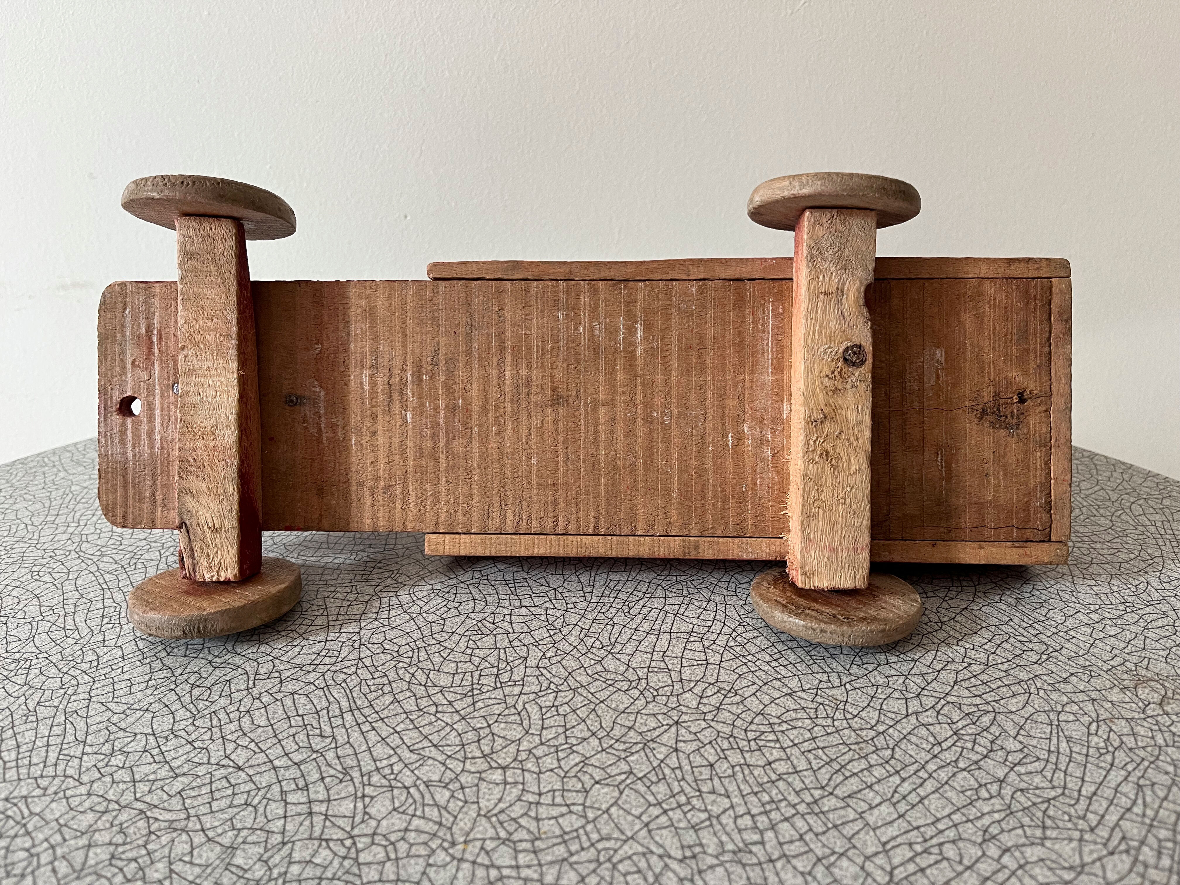 Red wooden flatbed truck. 1930s-40s