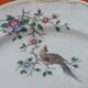 Round dish on board dilronné Chantilly France Floral decoration and polychrome crane called "Kakiemon"