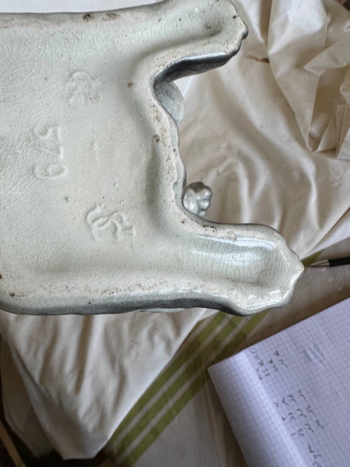 Poodle pitcher in slip