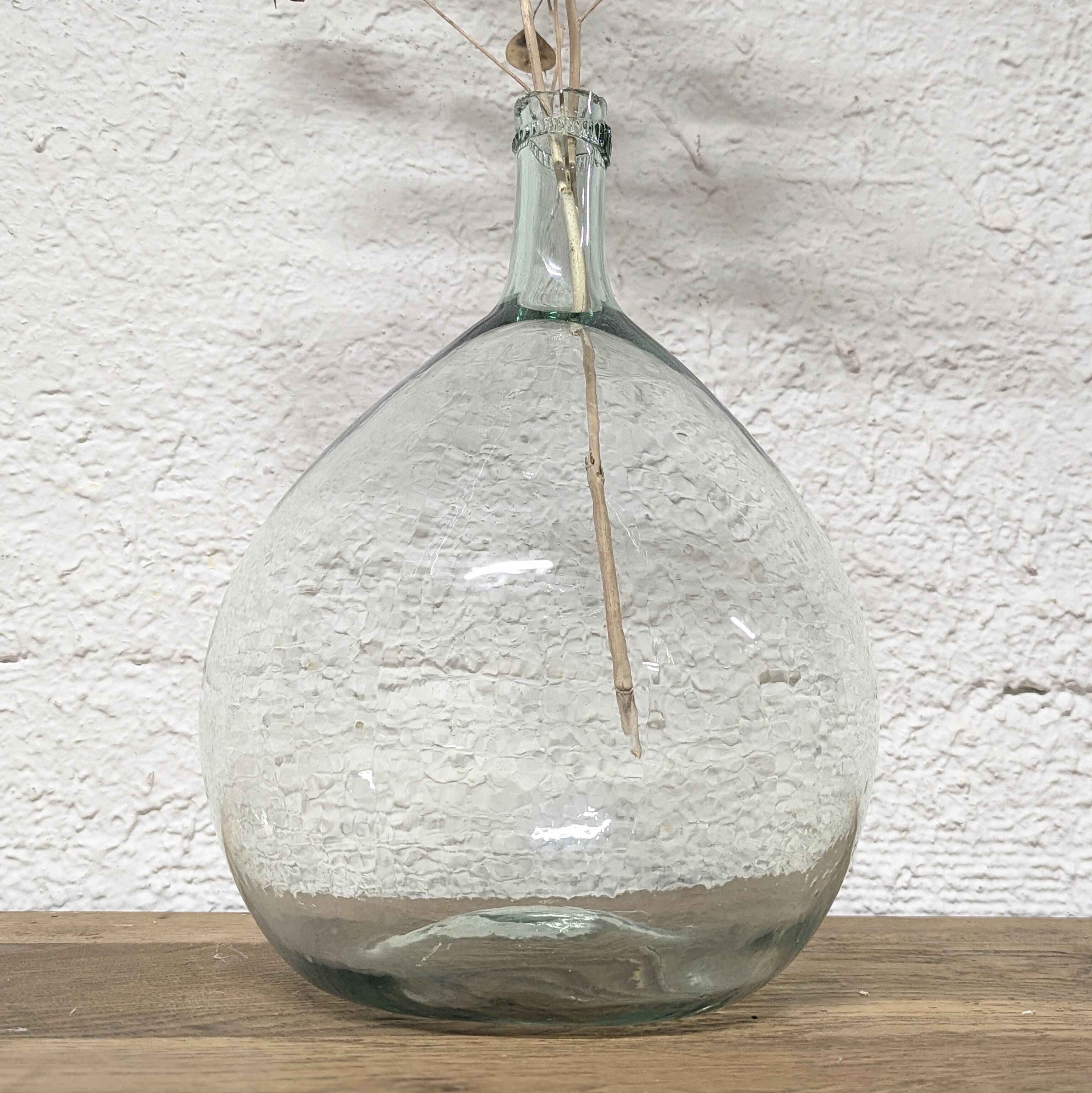 Transparent demijohn in blown glass