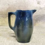 Blue glazed ceramic pitcher