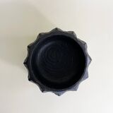 Brutalist wooden pocket emptier