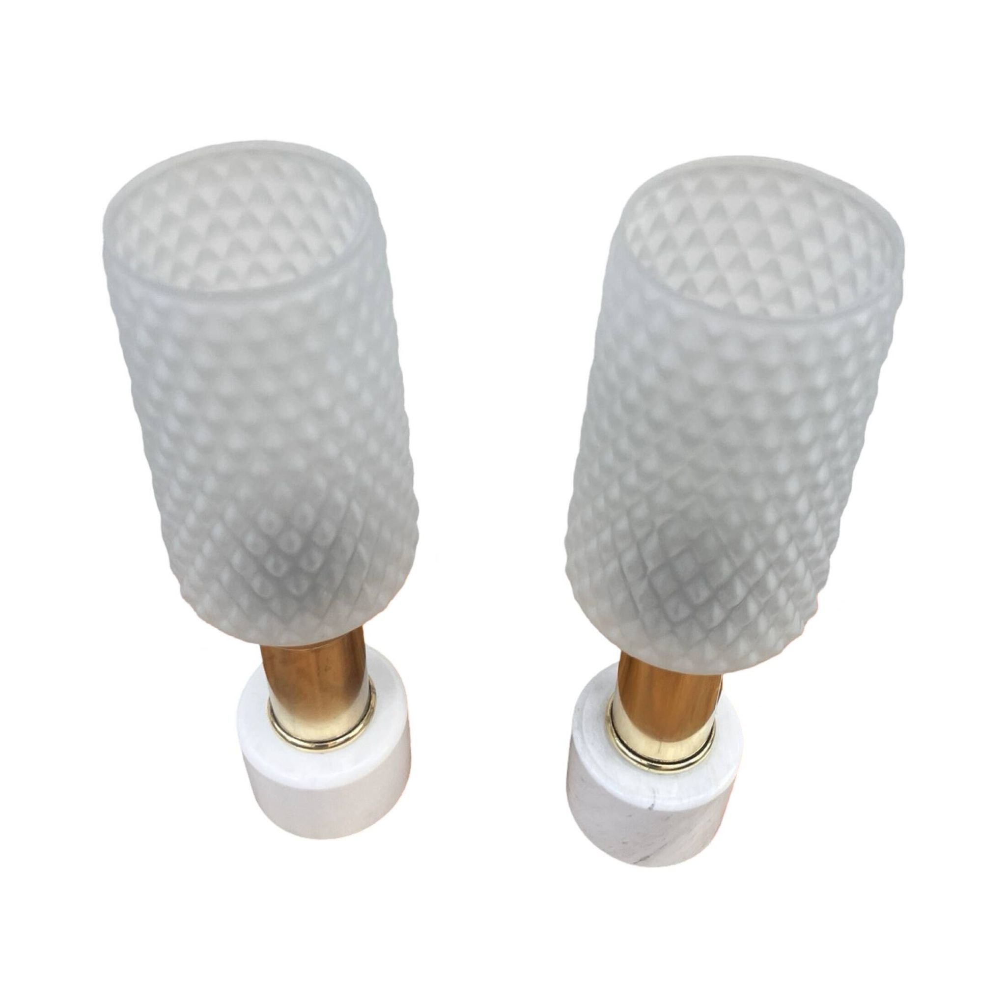 A pair of bedside lamps with a marble base, VEB Narva Leuchtenbau Lengefeld Germany, 1960s.