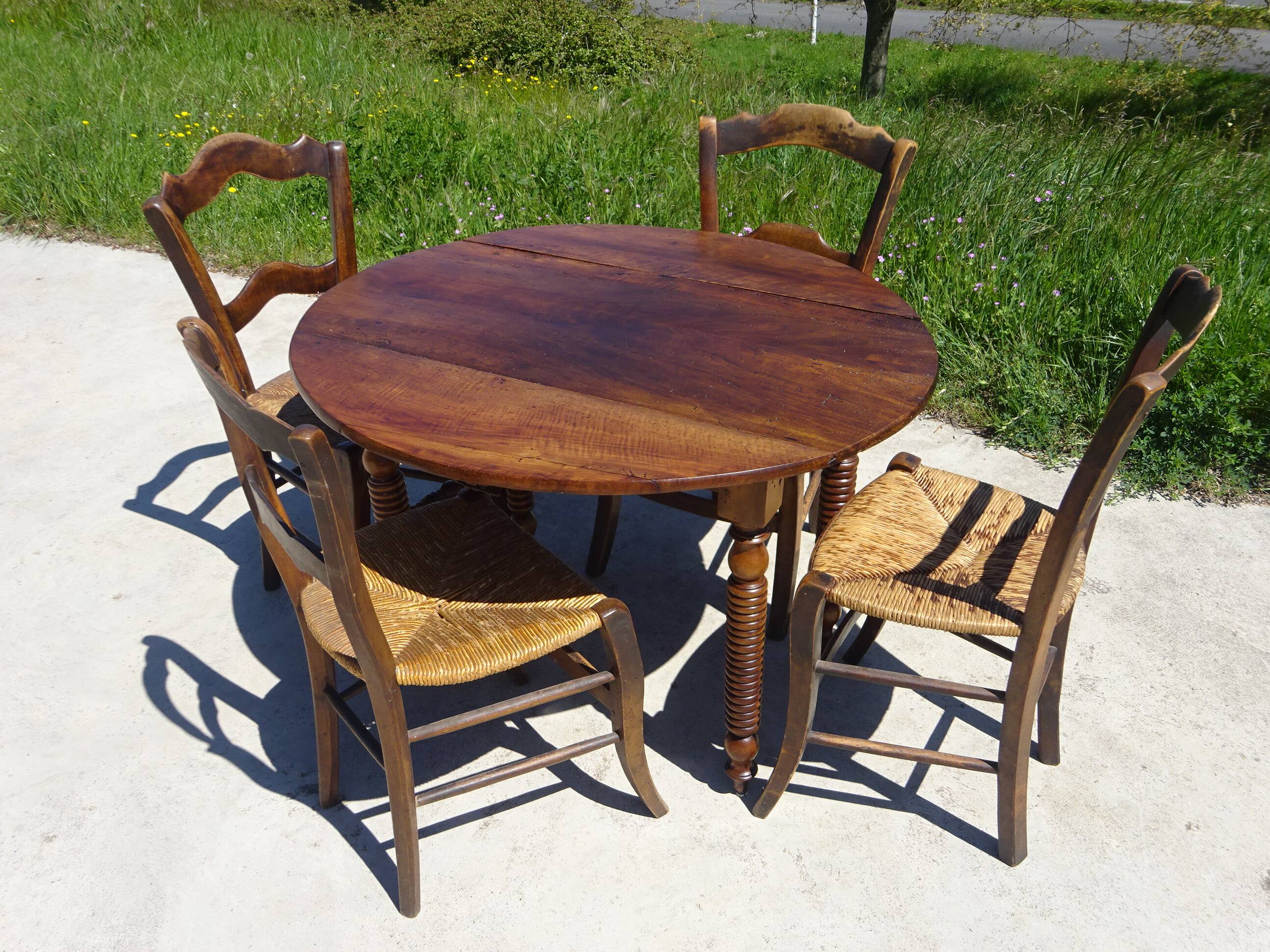 Antique walnut console table with honey spoon legs.