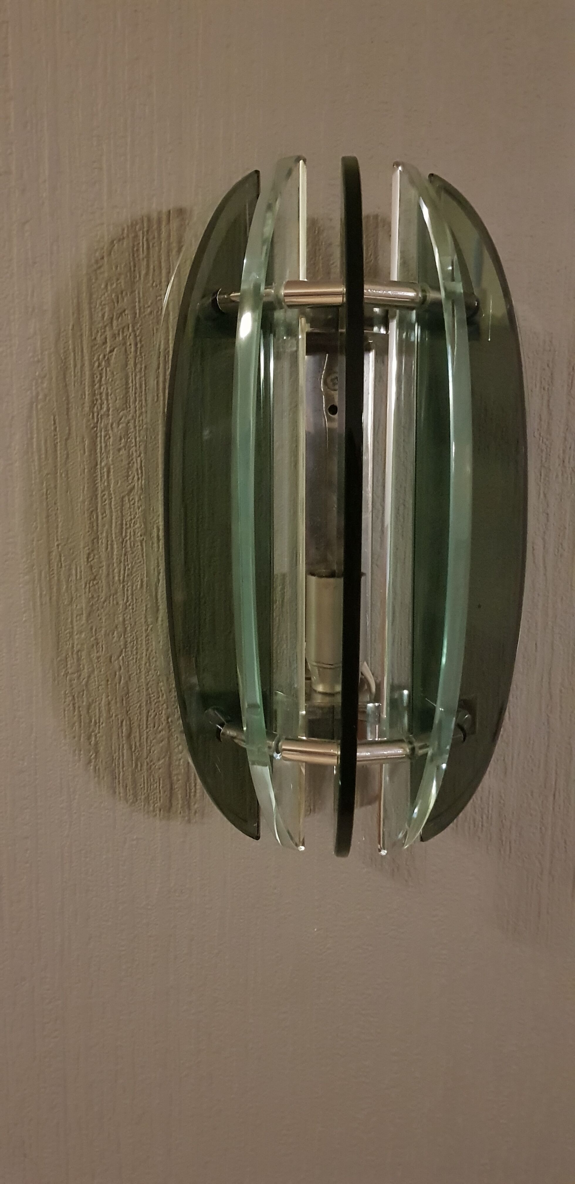 Veca pair of vintage wall light dating from the 1960s.