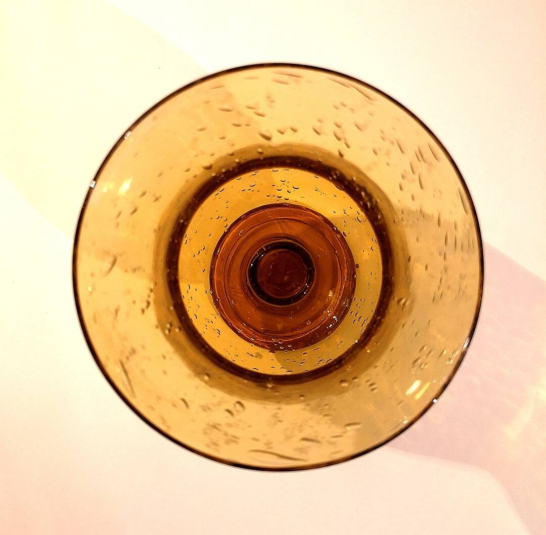 Biot tealight candle holder in blown, bubbled amber glass