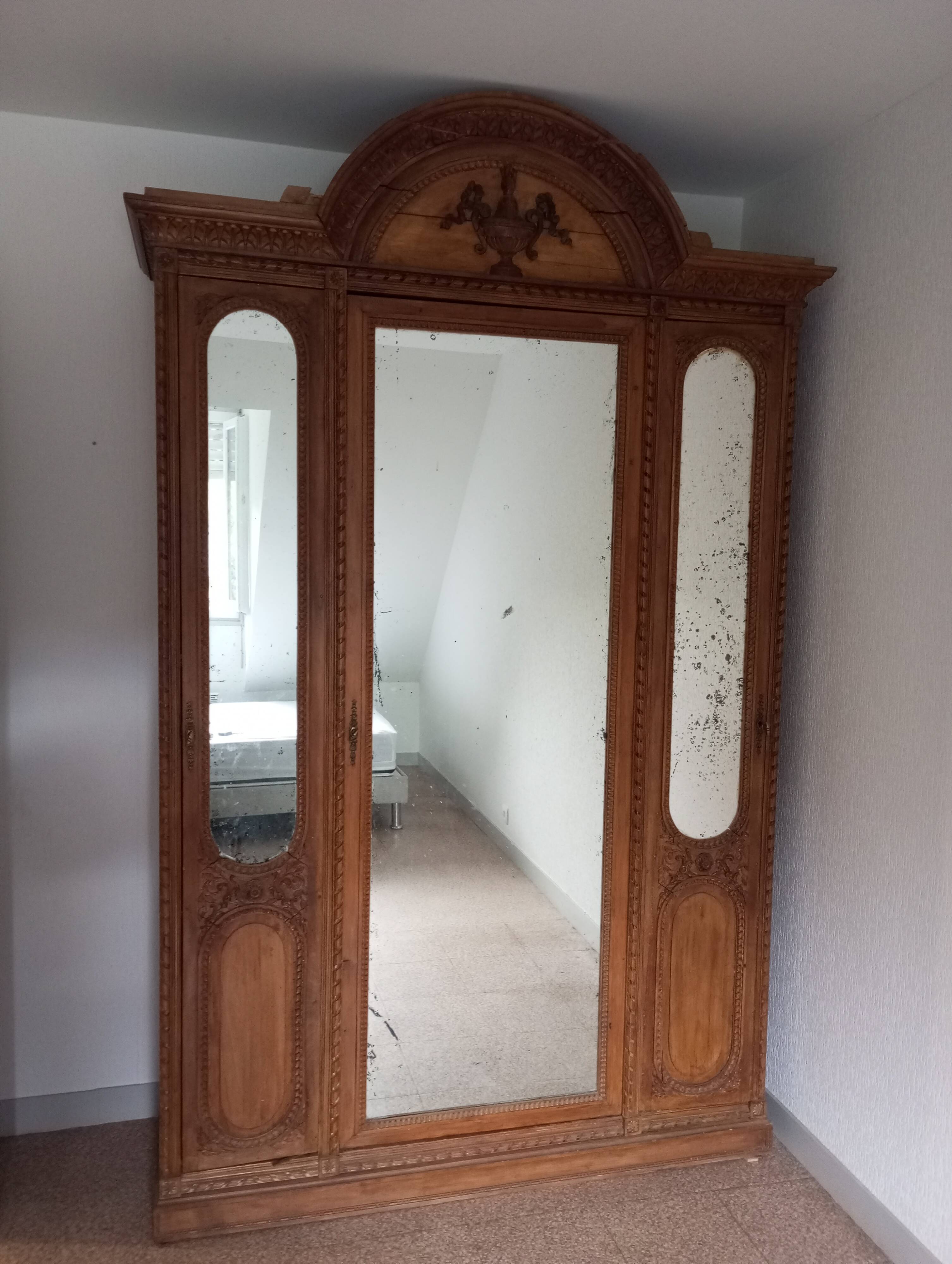 Old and large 3-door wardrobe