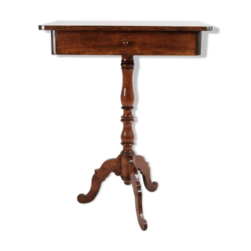 Side table on a mahogany pillar from around the year 1850s