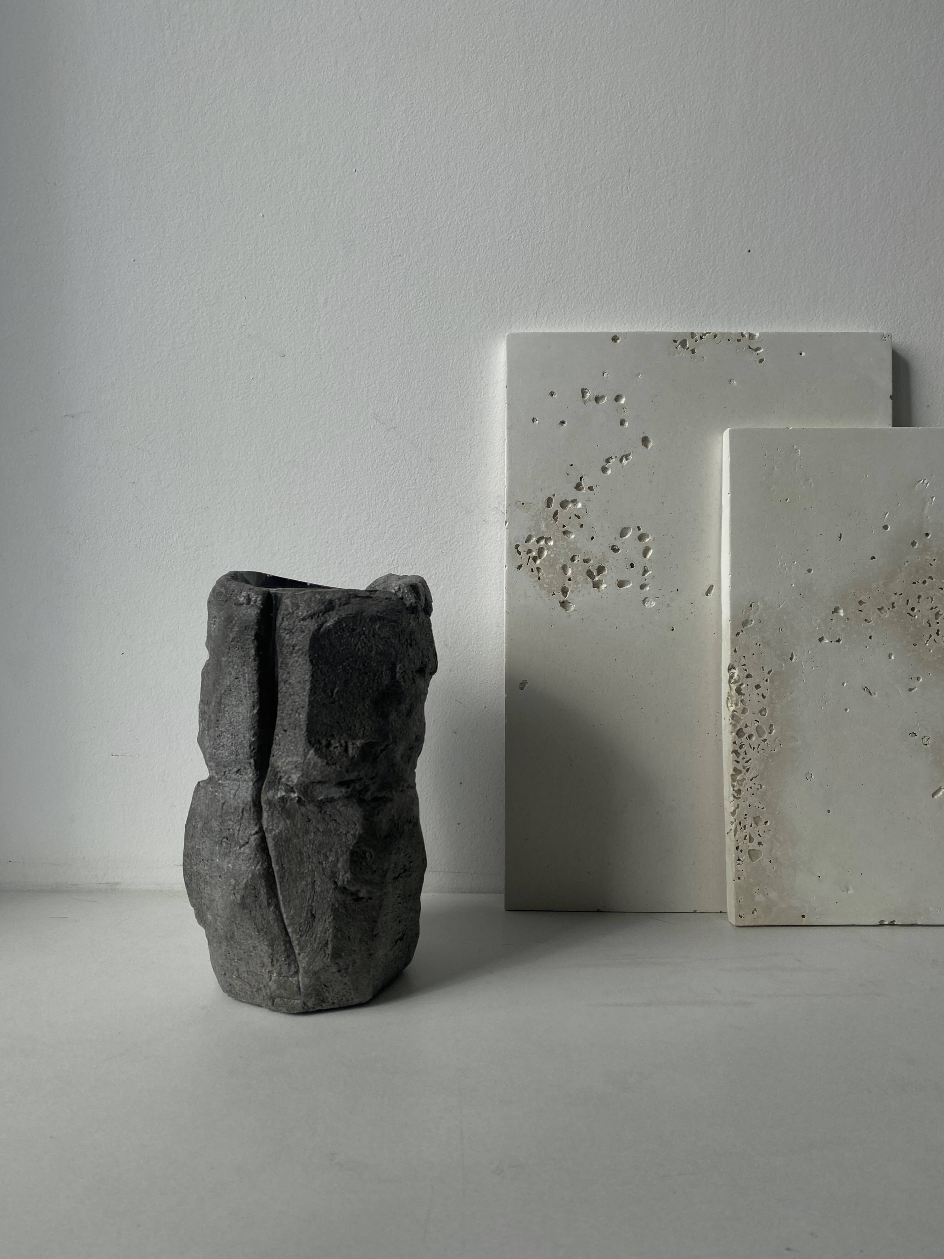 Sculpted concrete vase