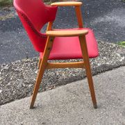 Red office chair in faux leather and wood, Mid-Century style (1960s)