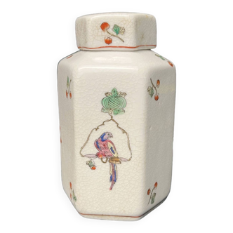 Asia, cracked ceramic tea pot with 20th century parrot decoration
