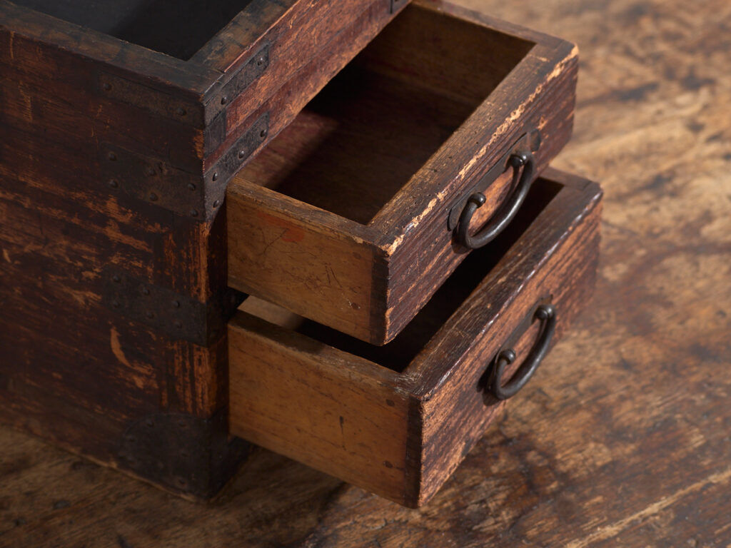 Japanese ko-dansu with hinged lid and paulownia wood drawers, Meiji–Taishō period, circa 1868–1926.