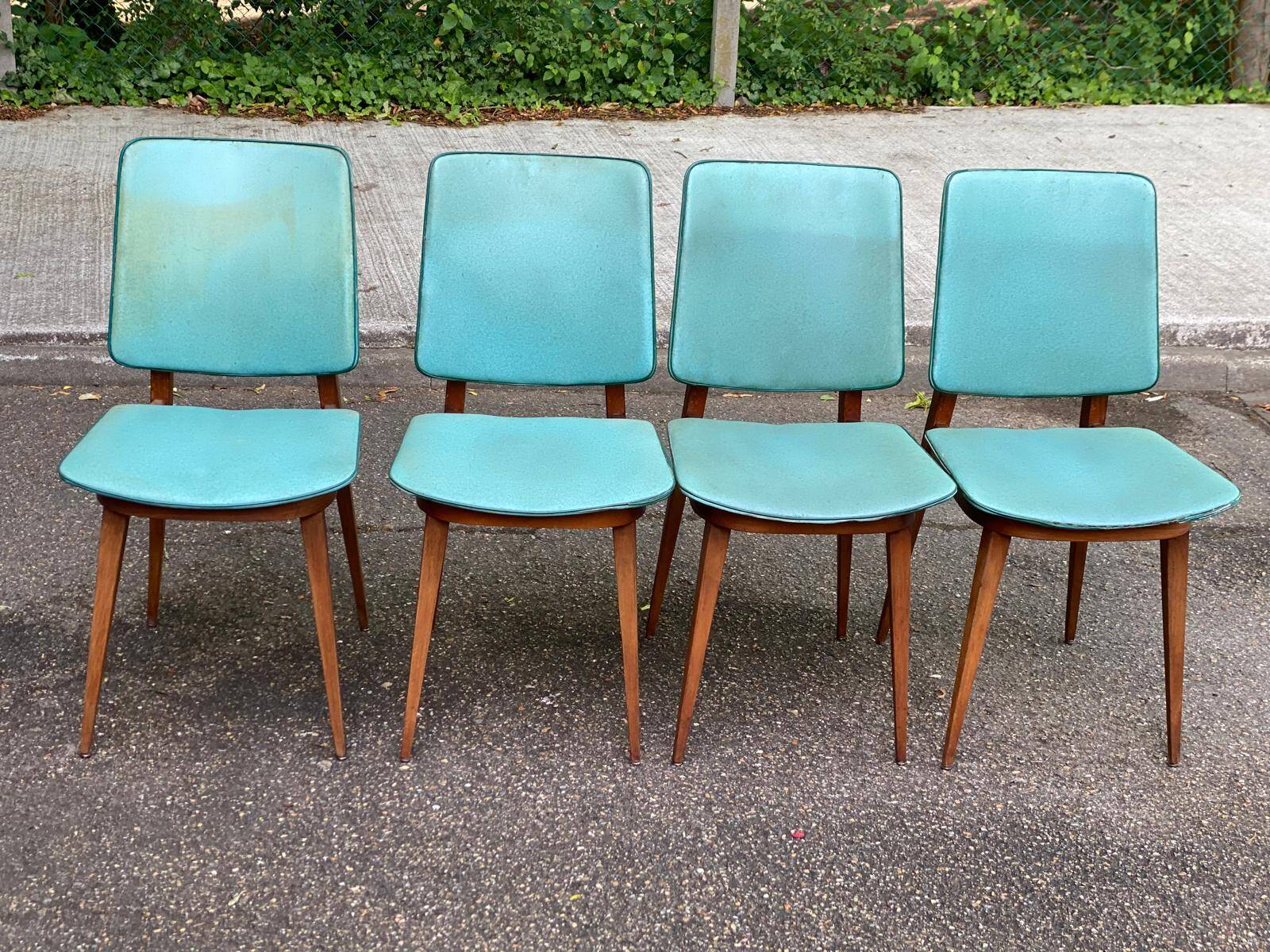 4 Scandinavian dining chairs in solid wood and blue-green leather from the 1950s.