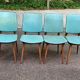 4 Scandinavian dining chairs in solid wood and blue-green leather from the 1950s.