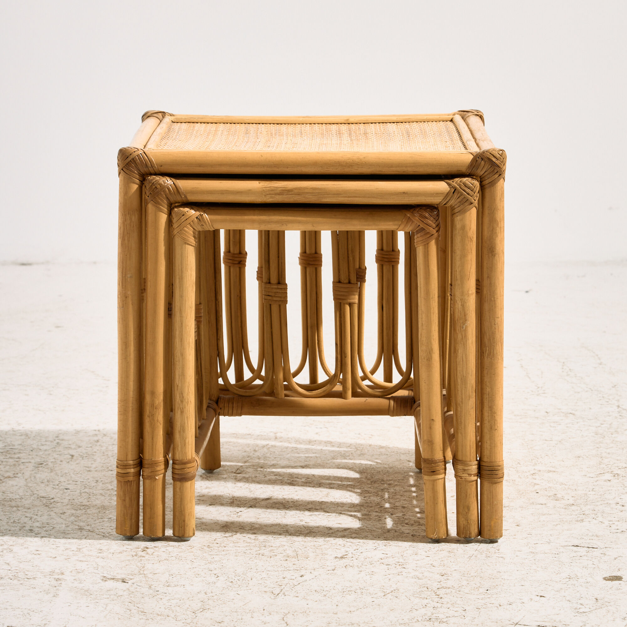 Nest of bamboo and rattan tables, set of 3.