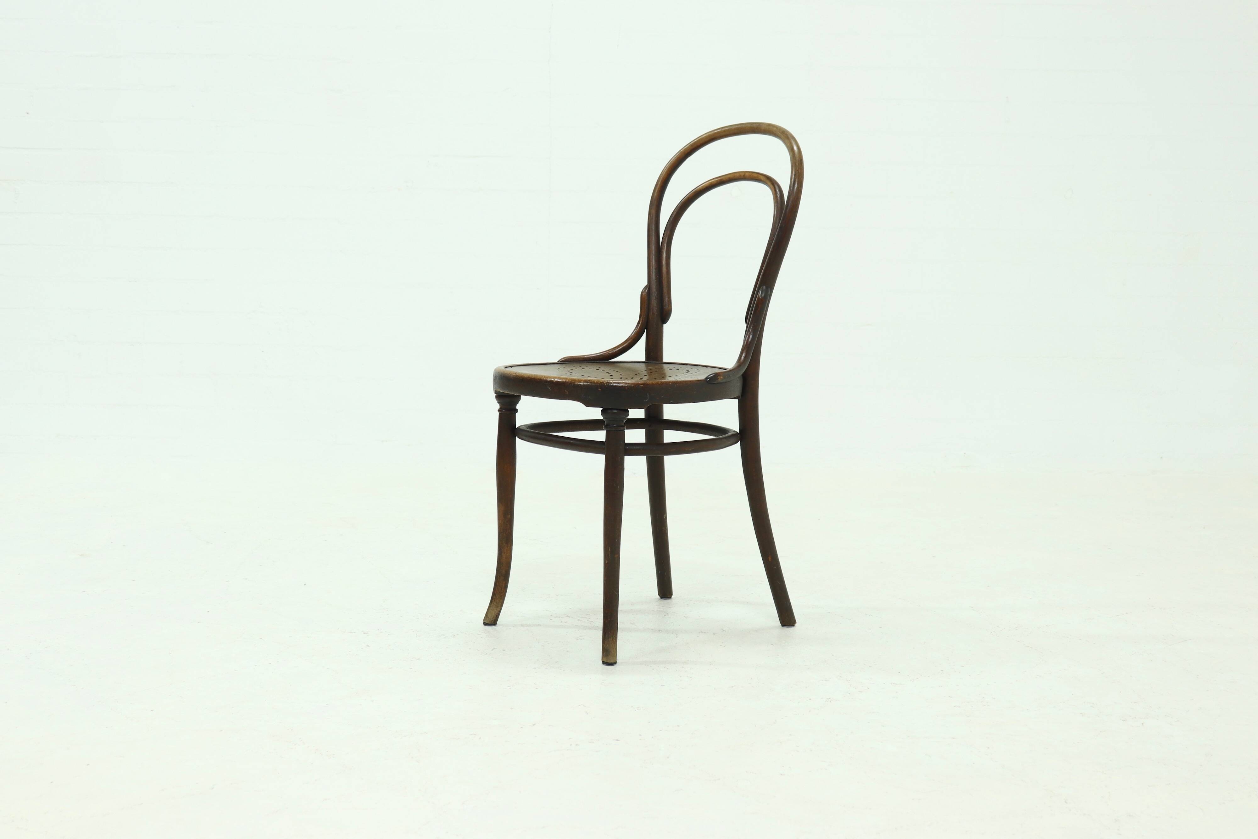 Antique Thonet Bistro Chair with Decorative Legs and Perforated Seat 1920s