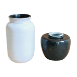Duo of small black and white ceramic vases