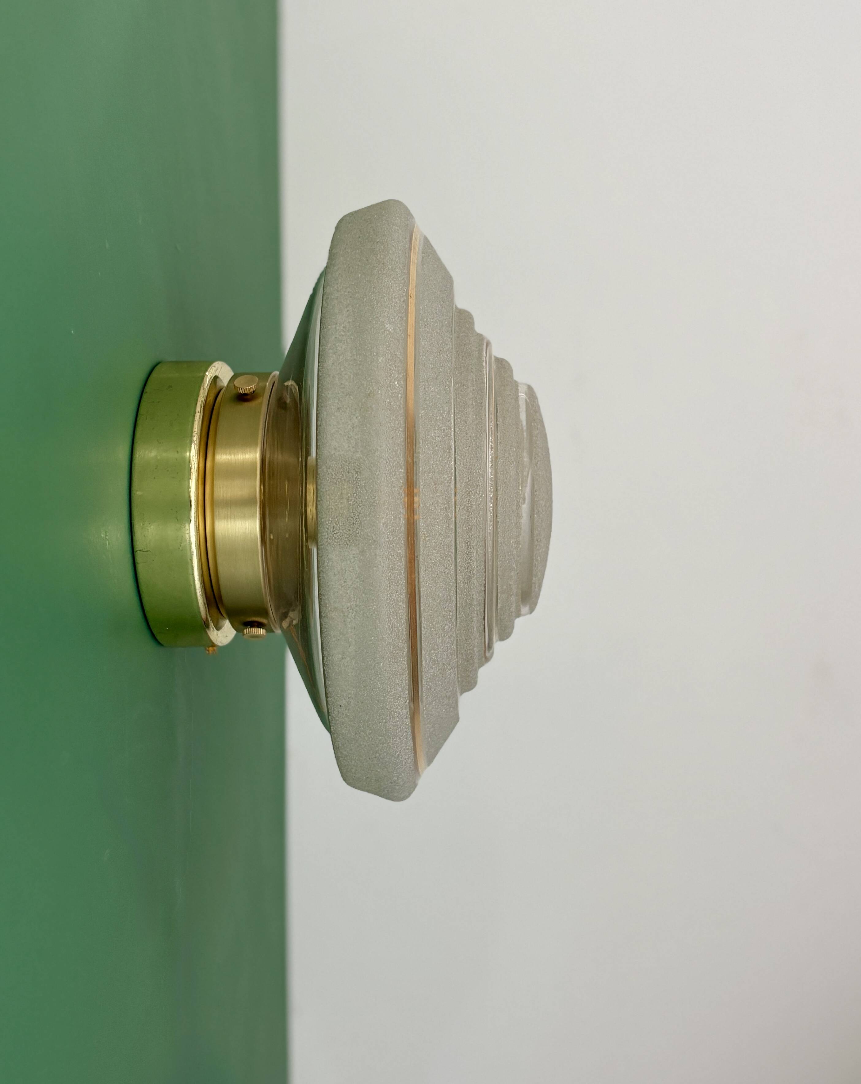 Old glass globe wall/ceiling light in frosted white and gold.