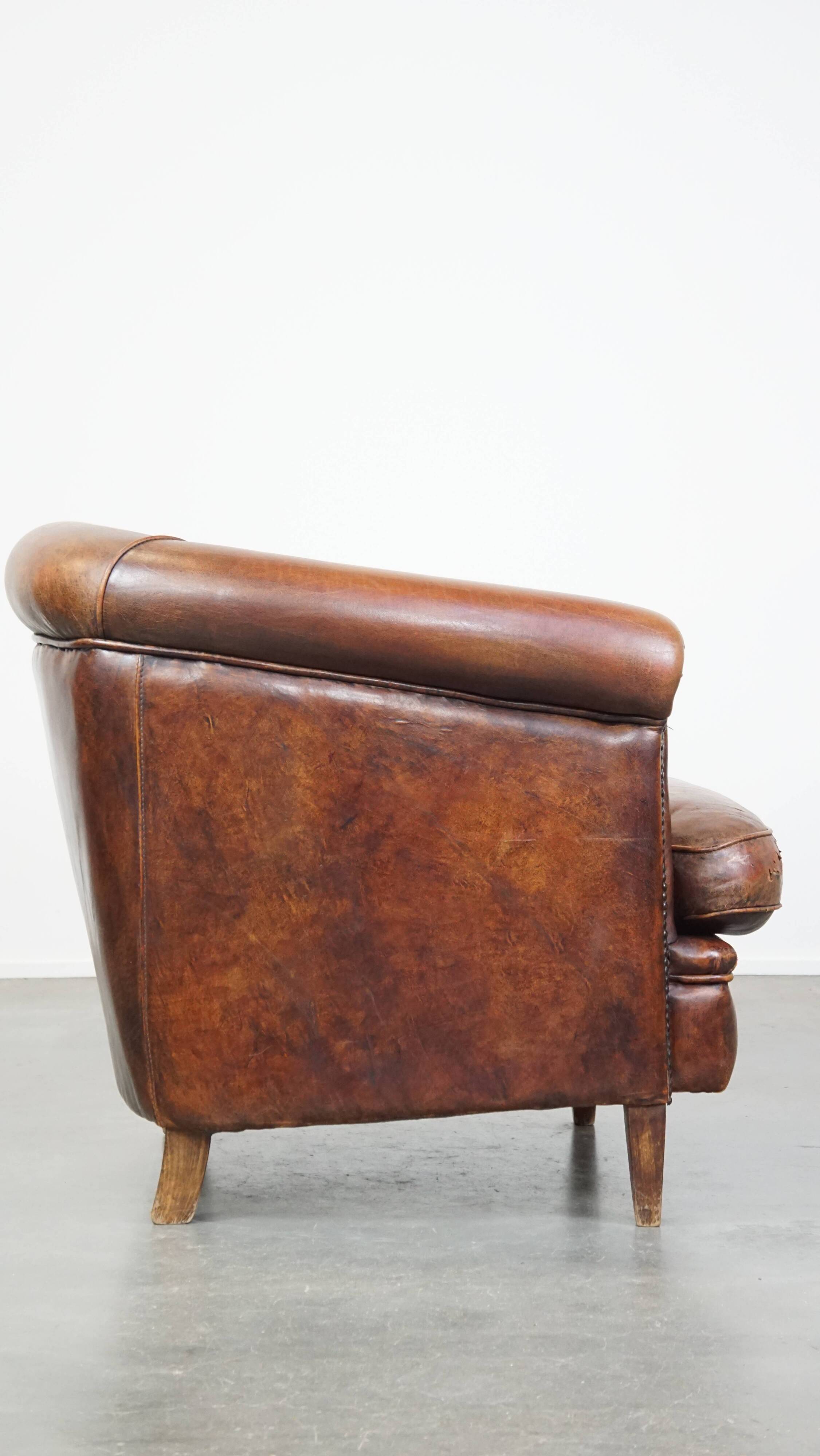 Cognac-colored sheepskin leather club chair