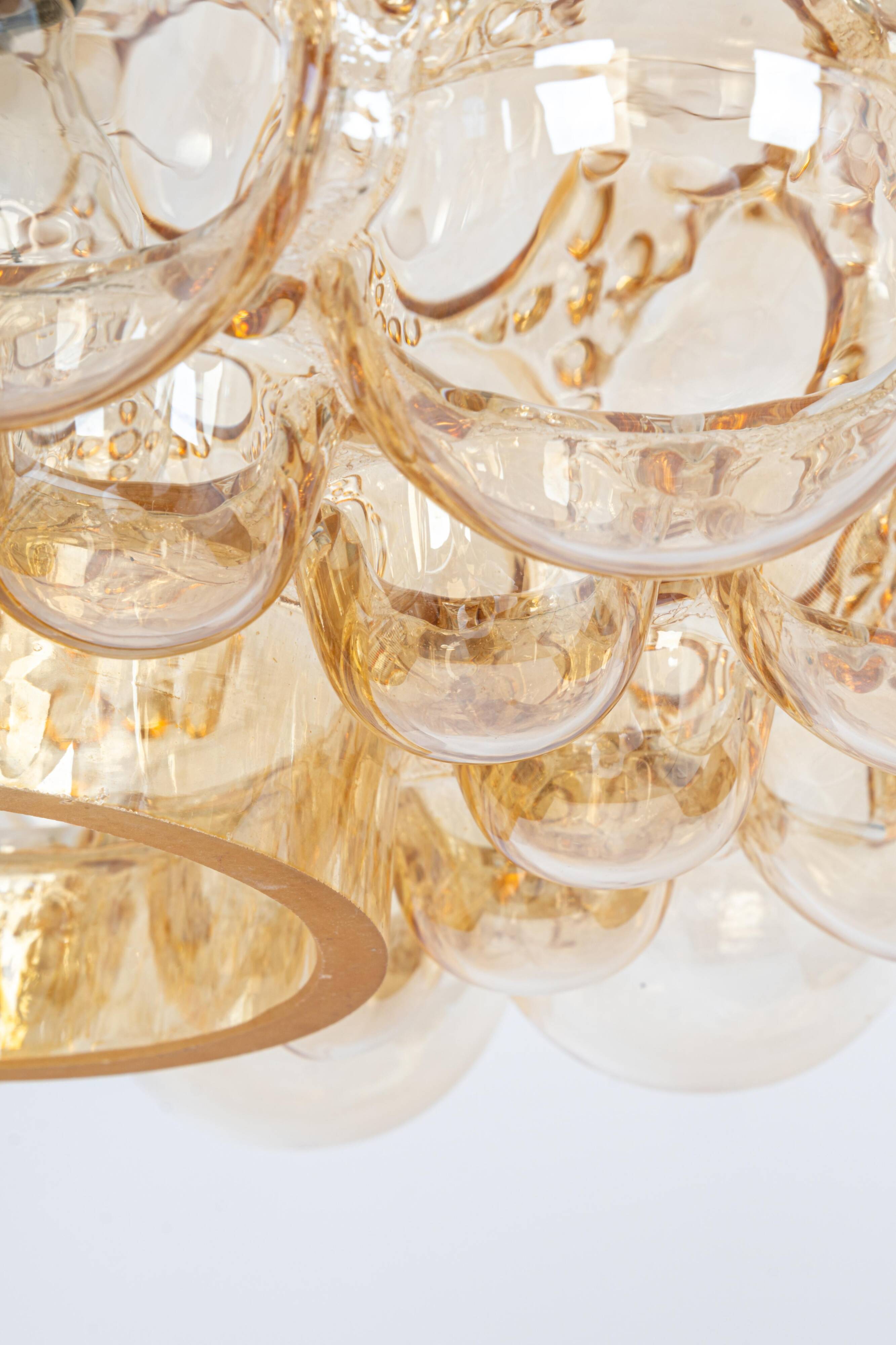 Large amber bubble glass pendant light by Helena Tynell for Limburg, Germany, 1970s.