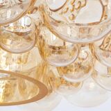 Large amber bubble glass pendant light by Helena Tynell for Limburg, Germany, 1970s.