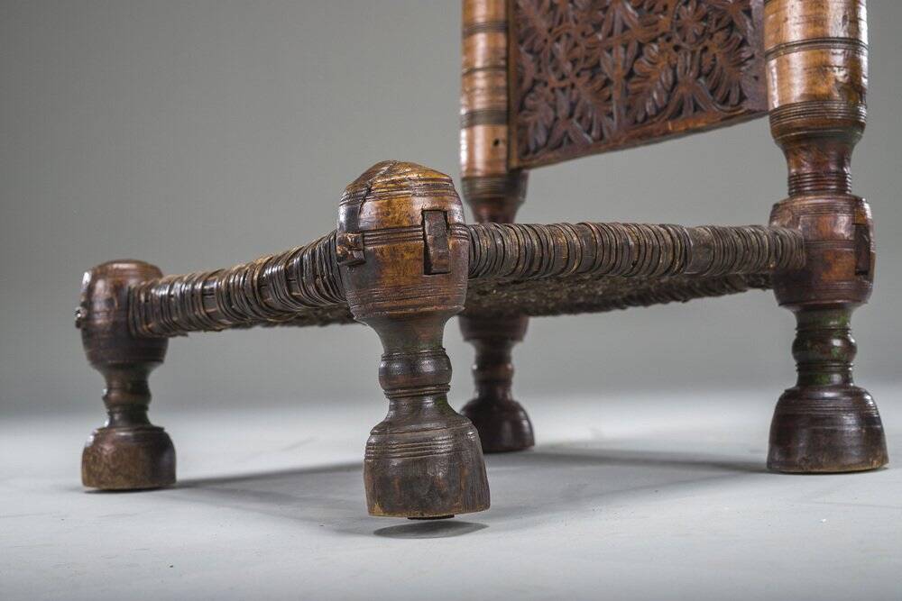 Early 20th century handmade low cedar chair, Nuristan, 1890s