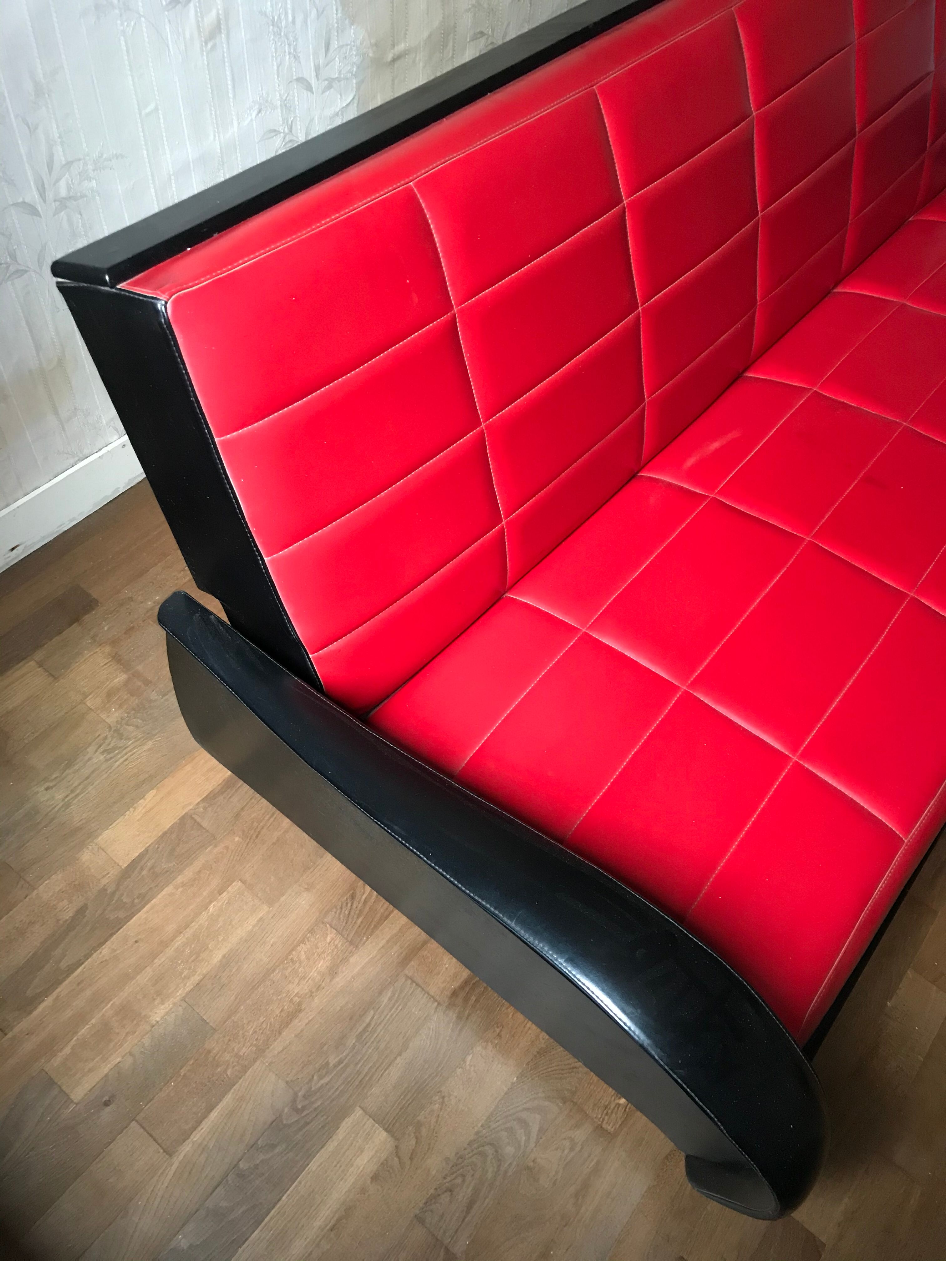 Canapé convertible vintage, skaï rouge et noir