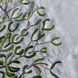 Hand-embroidered tablecloth on rectangular thread canvas