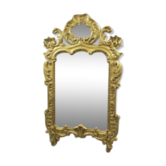 Antique mirror in gilded wood