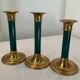 Trio of vintage bronze candle holders