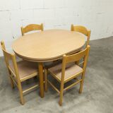 Modernist convertible oval table set and 4 matching chairs 1990