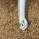 Louis XV style walnut table with a natural wood top.