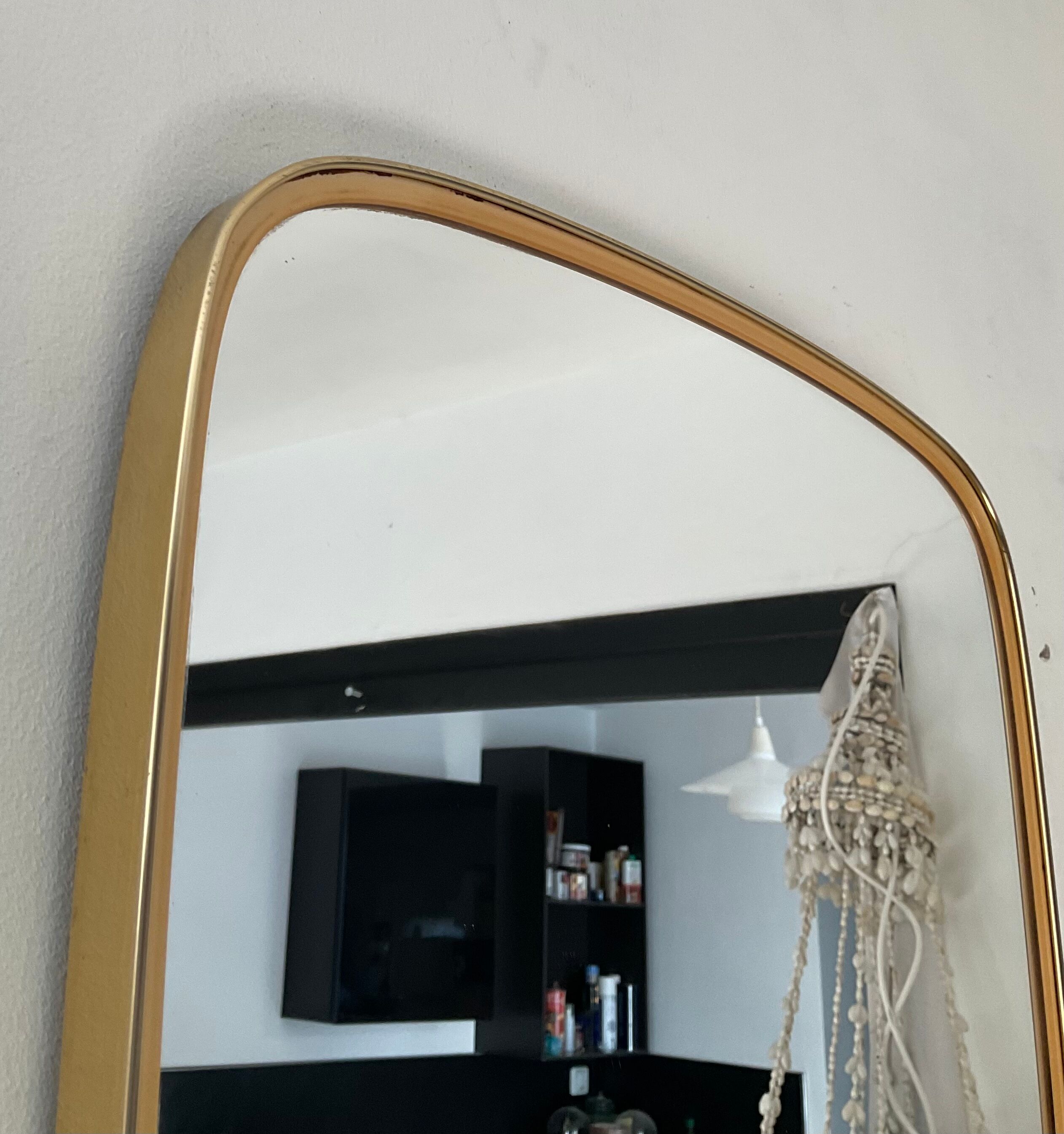 Free formę asymmetric mirror of the 70s