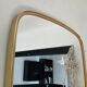 Free formę asymmetric mirror of the 70s
