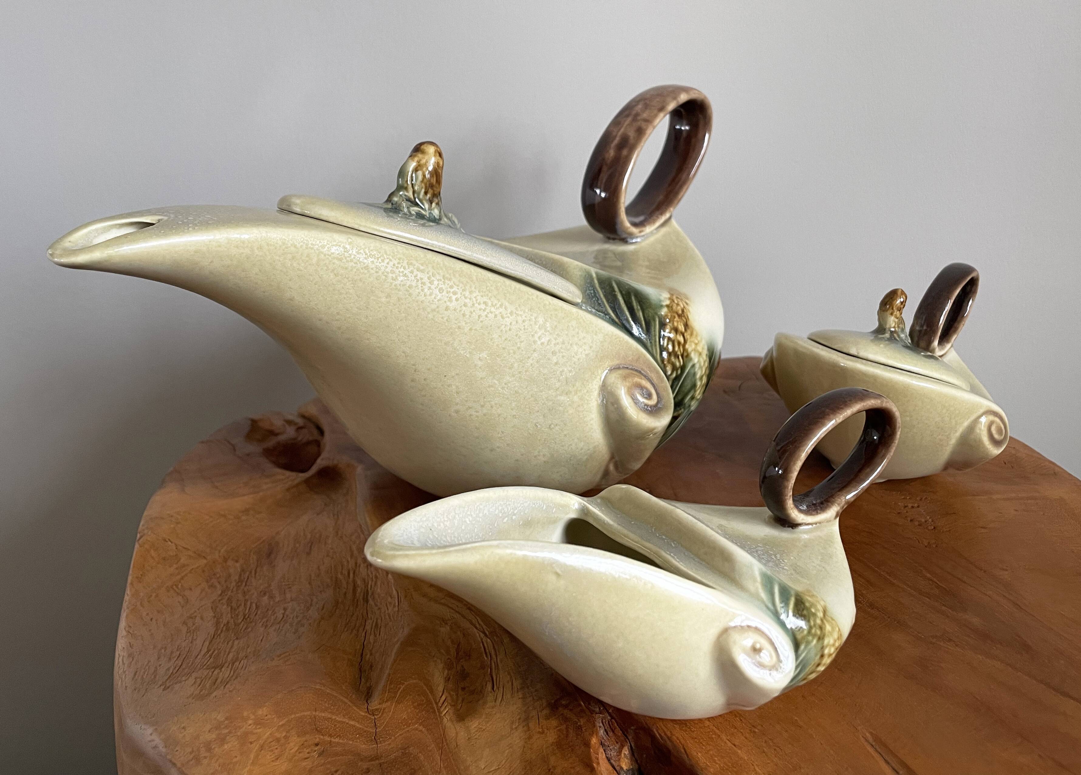 Hull pottery tea set parchment and pine, tea pot, creamer & sugar pot, american embossed majolica