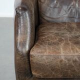 Very comfortable vintage cow leather armchair with beautiful colours